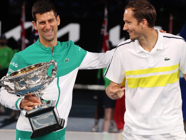 Australian Open tennis. 21/02/2021. Day 14...   Mens Final. Novak Djokovic vs Daniil Medvedev on Rod Laver Arena.  Novak Djokovic and Daniil Medvedev star a laugh at the presentation ceremony   . Pic: Michael Klein