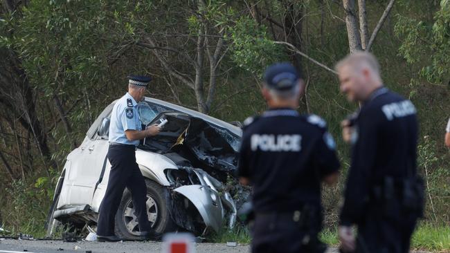 Police at the scene of a fatal car crash on the D'Aguilar Highway west of Wamuran on Sunday afternoon. Picture Lachie Millard