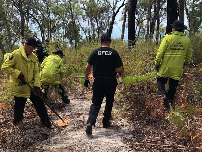 Fire crews have been working alongside the Butchulla people to fight the blaze on Fraser Island.