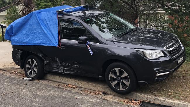 The Subaru Forester, in Kendal Cres, Wheeler Heights, that was hit by a car being driven by Lincoln Mobbs, 18, of Baulkham Hills. Picture: Jim O'Rourke