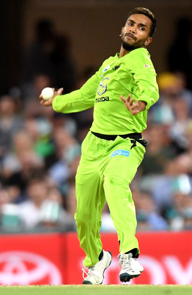 Arjun Nair of the Thunder bowls in the Big Bash League in 2019. (Photo by Bradley Kanaris/Getty Images)