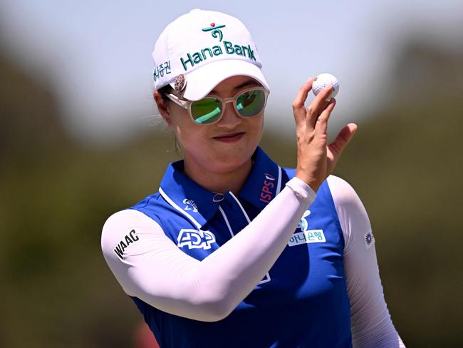 Minjee Lee smiles after sinking a birdie putt during the second round of the Australian Open. Picture: AFP