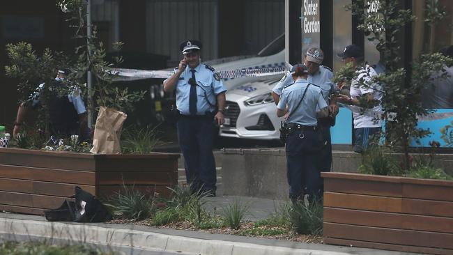 Police gather following the fatal crash. A independent investigation has commenced .Picture by Peter Lorimer.