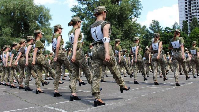 The Ukrainian Defence ministry press-service photos of the Ukrainian female soldiers wearing heels.