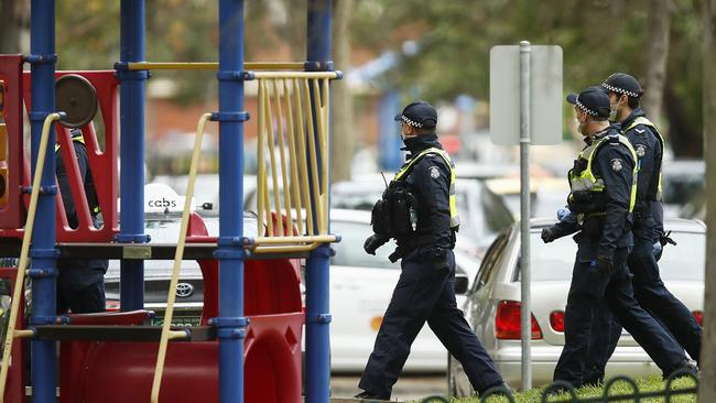 Police patrol a public housing tower. Picture: Getty