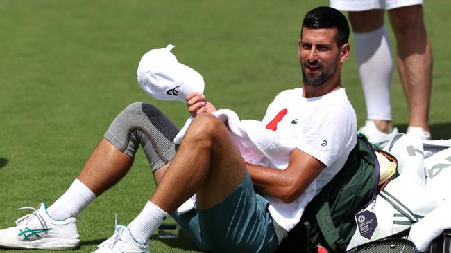 LONDON, ENGLAND - JUNE 29: Novak Djokovic of Serbia reacts during practice prior to The Championships Wimbledon 2024 at All England Lawn Tennis and Croquet Club on June 29, 2024 in London, England. (Photo by Clive Brunskill/Getty Images)