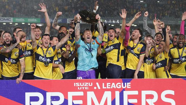 The Central Coast Mariners celebrate winning the 2023/24 A-League premiership.