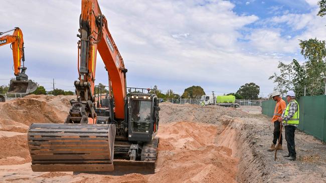 Professor Maciej Henneberg, in yellow hi-vis, at the site being excavated. Picture: NewsWire / Brenton Edwards