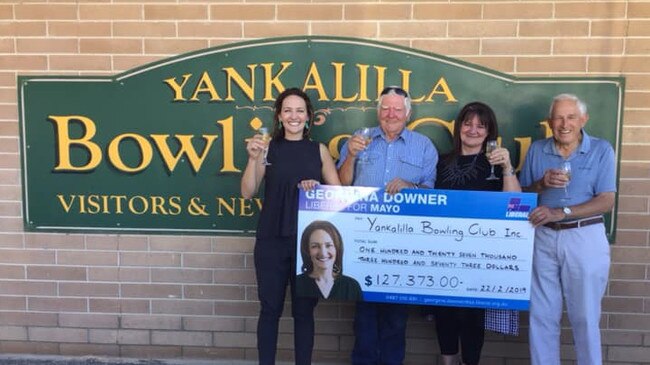 Then Liberal candidate for Mayo Georgina Downer handing a cheque to the at Yankalilla Bowling club during the 2019 election campaign. Picture: Georgina Downer