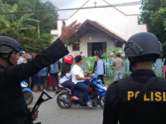 Several children were injured after a man allegedly threw low-explosive cocktail bombs at a church during a Sunday service. Picture: AFP