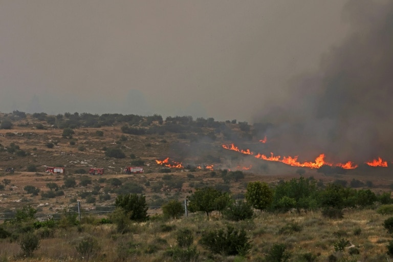 Israel reopens key roads as firefighters battle blaze