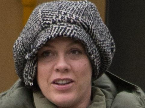 American singer Pink and husband Carey Hart pictured here with their daughter Willow waiting for a tram in Melbourne as they hit the local shops.