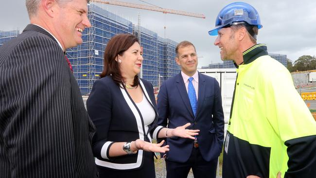 Premier Annastacia Palaszczuk and former Games Minister Stirling Hinchliffe with Grocon Executive Chairman Daniel Grollo and site manager Michael Moore from Schoenauer Pty Ltd. Pic by Richard Gosling