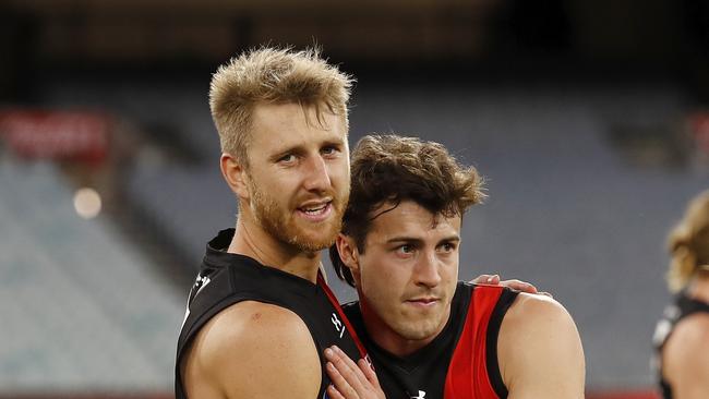 Essendon captain Dyson Heppell celebrates with Andy McGrath after the Bombers defeated Collingwood by 38 points in their final clash before an elimination final against the Western Bulldogs in Launceston. (Photo by Dylan Burns/AFL Photos via Getty Images)