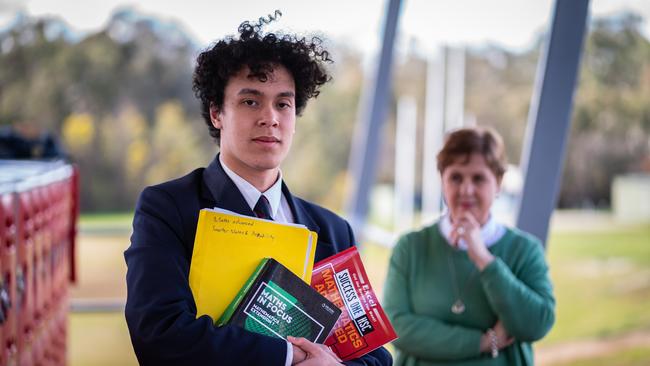 Patrick Duggan attends Trinity Anglican College in Albury who lives in Beechworth and Kym Armstrong a teacher who lives in Wodonga but works in Albury. Picture: Simon Dallinger