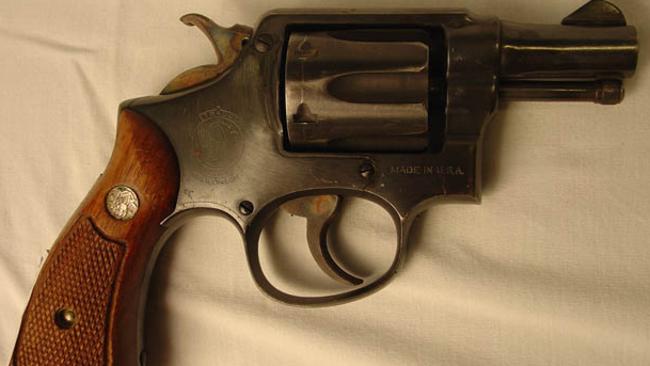 A snub-nose .38 pistol.