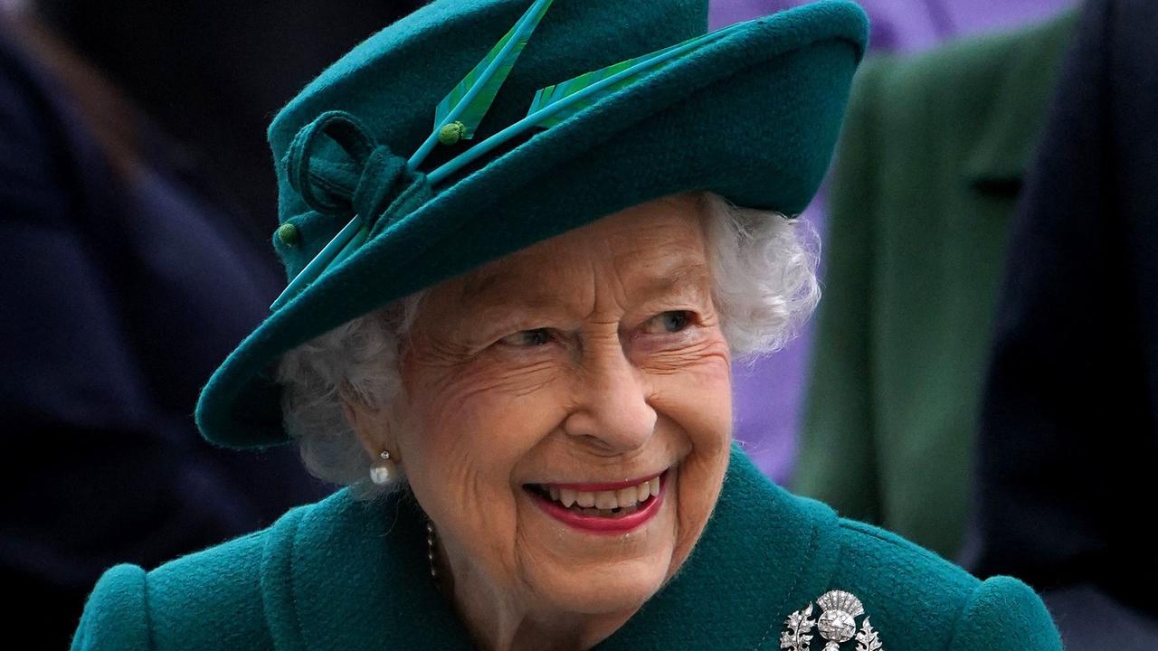 Queen Elizabeth, at the opening of the sixth session of the Scottish parliament last week, can pop put for a drink whenever she wants via the secret tunnel. (Photo by Andrew Milligan / POOL / AFP)