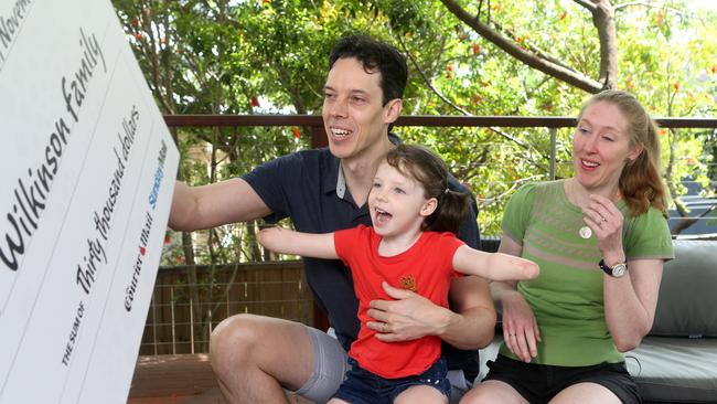 The Wilkinsons excitedly receive their donation. Picture: AAP/Steve Pohlner