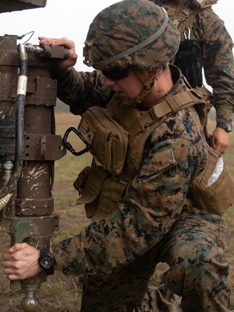 U.S. Marine Corps Lance Cpl. Ace Killough, a field artillery radar operator with 3d Battalion, 12th Marines, 3d Marine Division, elevates a Ground Air Task Oriented Radar during Talisman Sabre 2021 at Shoalwater Bay Training Area, Queensland, Australia, July 14, 2021. TS21 is a large-scale, bilateral military exercise conducted biennially across Northern Australia designed to enhance the U.S.-Australia alliance which is an anchor of peace and stability in the Indo-Pacific. Exercises like this provide effective and intense training to ensure our forces are capable, interoperable, responsive, and combat-ready. Killough is a native of Houston, Texas. (U.S. Marine Corps photo by Lance Cpl. Ujian Gosun)