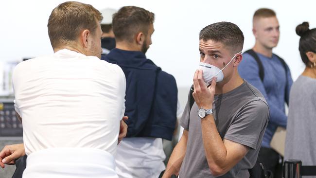 Cameron Devlin wears a face mask at Wellington Airport, before the departure of the Wellington Phoenix team to Sydney Picture: Getty Images