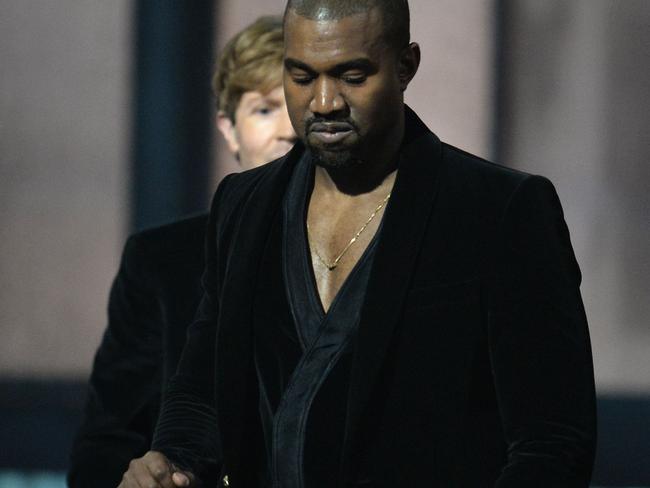 See ya later Kanye ...  the rapper leaves the stage. Picture: AFP