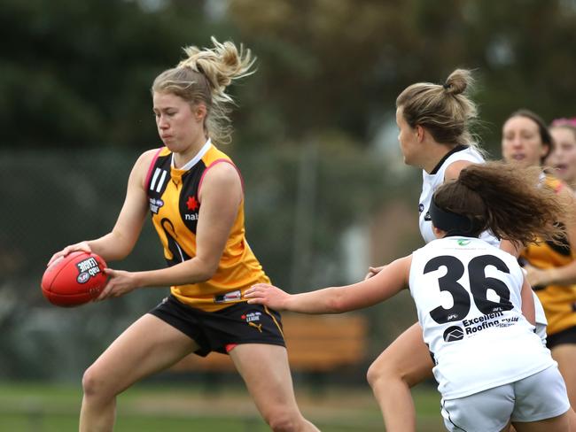 Emily Shepherd takes a kick for the Stingrays. Picture: Stuart Milligan