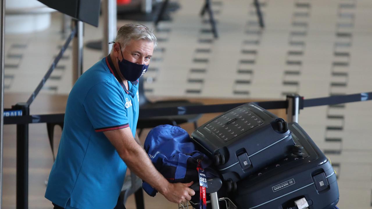 Members of the England Test cricket team arrive at Brisbane International Airport from Dubai. Head coach Chris Silverwood. Picture: Zak Simmonds