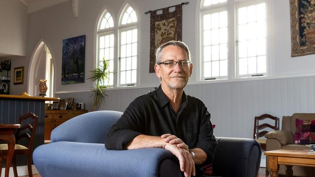 University of Queensland COVID-19 vaccine researcher Professor Paul Young in his home: a converted church. Picture: Richard Walker