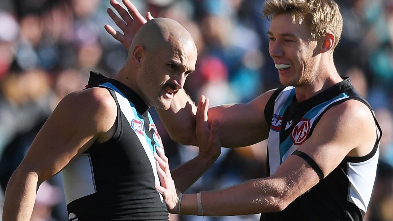 Sam Powell-Pepper celebrates a goal with Todd Marshall. Picture: Mark Brake/Getty Images