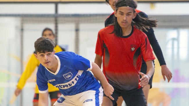 ADELAIDE, AUSTRALIA - Advertiser Photos DECEMBER 15, 2021: Action shots on Court 1 Prospect Futsal Club Youth (blue) vÃs Riverland FC Open Mens (red) at the State Futsal Championships, St Clair Recreation Centre, SA. Picture: Emma Brasier