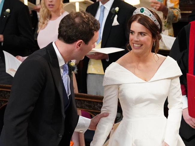 Eugenie flashes Jack a reassuring smile during the ceremony. Picture: Getty