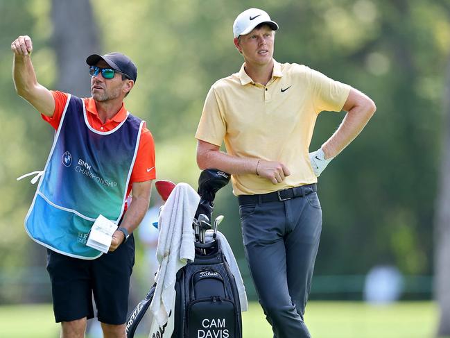 OLYMPIA FIELDS, ILLINOIS - AUGUST 17: Cam Davis of Australia and his caddie line up a shot from the fifth hole during the first round of the BMW Championship at Olympia Fields Country Club on August 17, 2023 in Olympia Fields, Illinois.   Michael Reaves/Getty Images/AFP (Photo by Michael Reaves / GETTY IMAGES NORTH AMERICA / Getty Images via AFP)