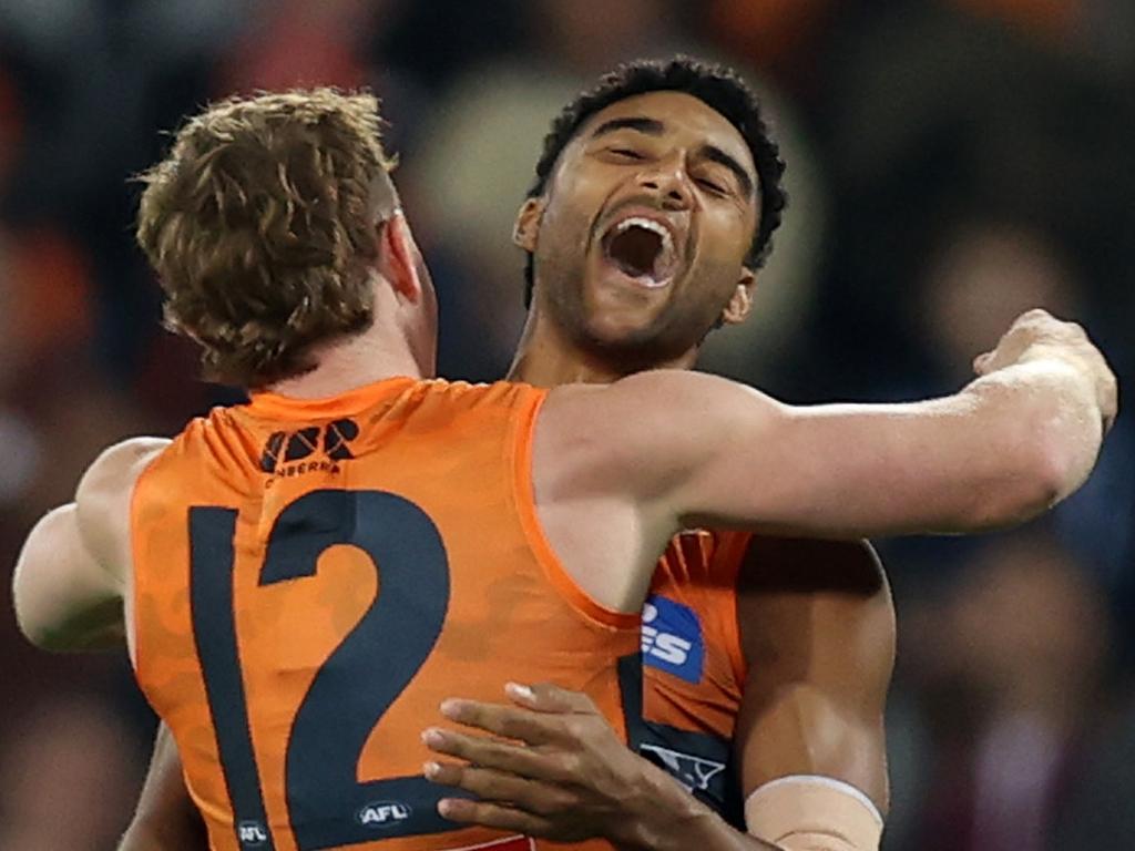 CANBERRA, AUSTRALIA – APRIL 25: Callum M. Brown of the Giants celebrates a goal during the round seven AFL match between Greater Western Sydney Giants and Brisbane Lions at Manuka Oval on April 25, 2024 in Canberra, Australia. (Photo by Jason McCawley/AFL Photos/via Getty Images )