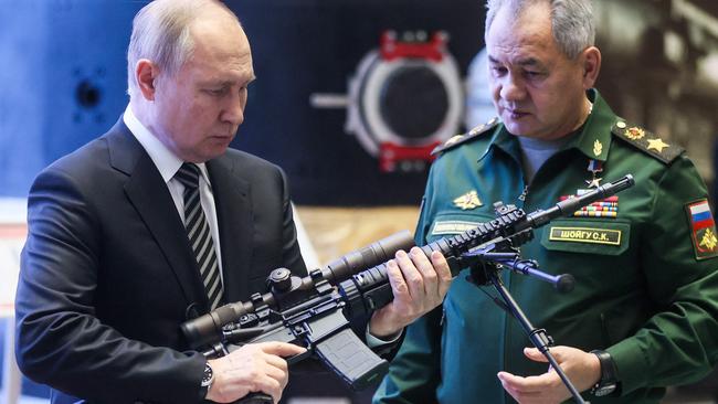 Russian President Vladimir Putin and Defence Minister Sergei Shoigu. Picture: Mikhail Metzel/Sputnik/AFP