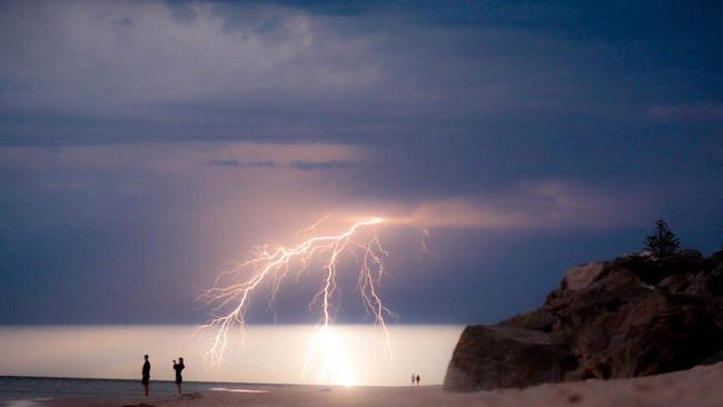 Daring photographers were out capturing Thursday’s lightning storm from, Brighton beach. Picture: Tania Verbeeck