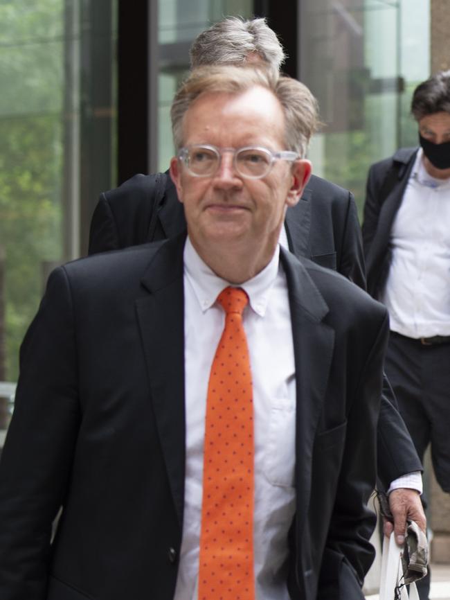 Nick Murray (in the orange tie) exiting the Supreme Court. Picture / Monique Harmer