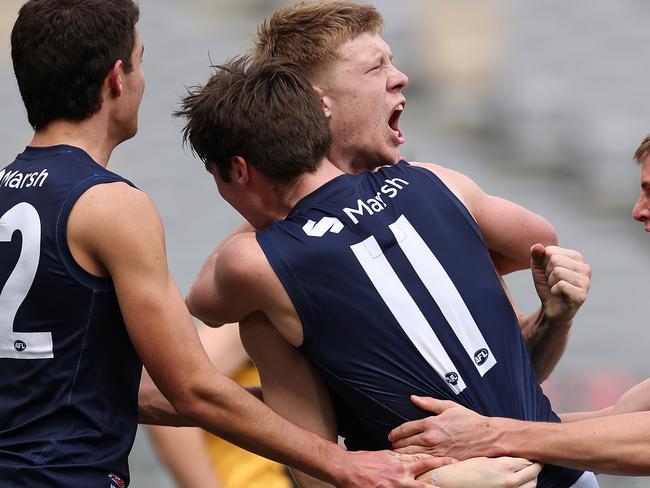 PERTH, AUSTRALIA - JUNE 23: Thomas Sims of Victoria Metro celebrates a goal during the Marsh AFL National Championships match between U18 Boys Western Australia and Victoria Metro at Optus Stadium on June 23, 2024 in Perth, Australia. (Photo by Paul Kane/AFL Photos/via Getty Images)