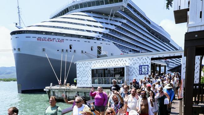 Virgin Voyages' brand new cruise ship, the Resilient Lady, has docked in Cairns for the first time. 200 guests from the cruise ship head to the Marlin Marina to head out to the Great Barrier Reef for the day on Reef Magic. Picture: Brendan Radke