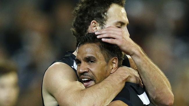 Andrew Krakouer celebrates after kicking a goal