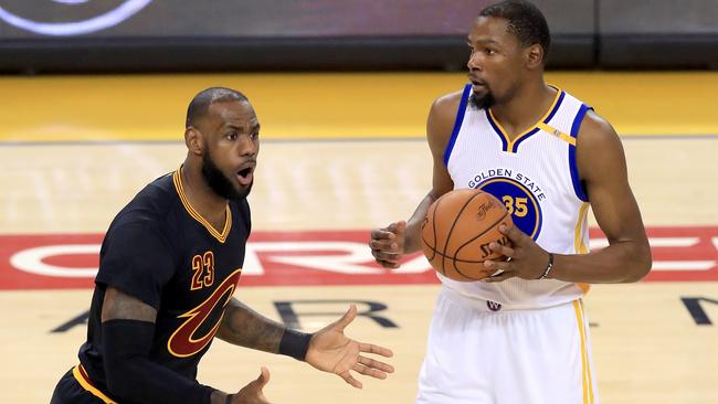 LeBron James is called for a foul against Kevin Durant. Picture: Getty