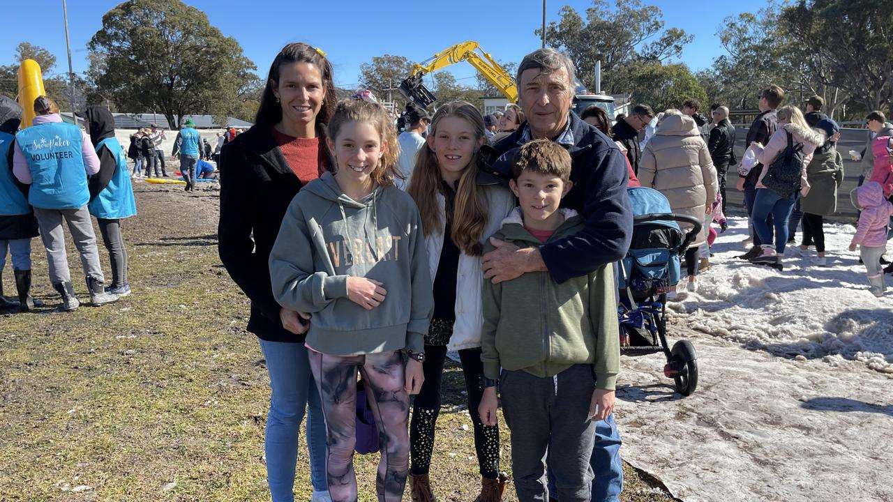 Allora family Merrida Jones with kids Claire (10), Carly (12) and Will Cantwell (9) and grandfather Alan Jones at the Snowflakes in Stanthorpe 2021 festival. Photo: Madison Mifsud-Ure / Stanthorpe Border Post