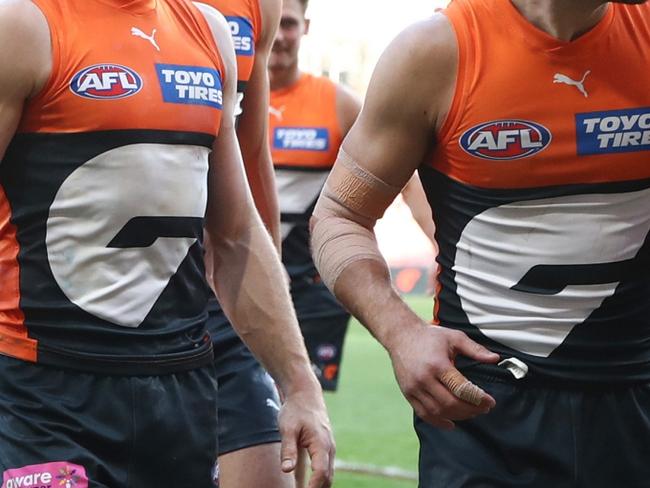 SYDNEY, AUSTRALIA - AUGUST 17: Giants players celebrate victory following the round 23 AFL match between Greater Western Sydney Giants and Fremantle Dockers at ENGIE Stadium on August 17, 2024 in Sydney, Australia. (Photo by Jason McCawley/AFL Photos/via Getty Images)