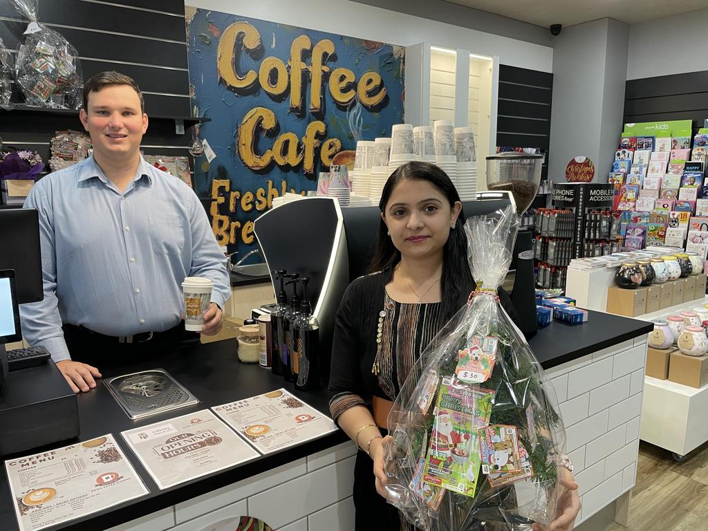 Colliers leasing executive Reagan Stokely with New Extra Kirwan co-owner Prerna Thukral in the new newsagency that offers coffees and gifts in Thuringowa Village Shopping Centre. Picture: Leighton Smith.