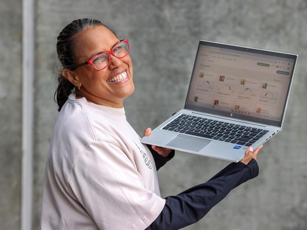 Olympian Cathy Freeman with her AncestryDNA results. Picture: Andrew Tauber