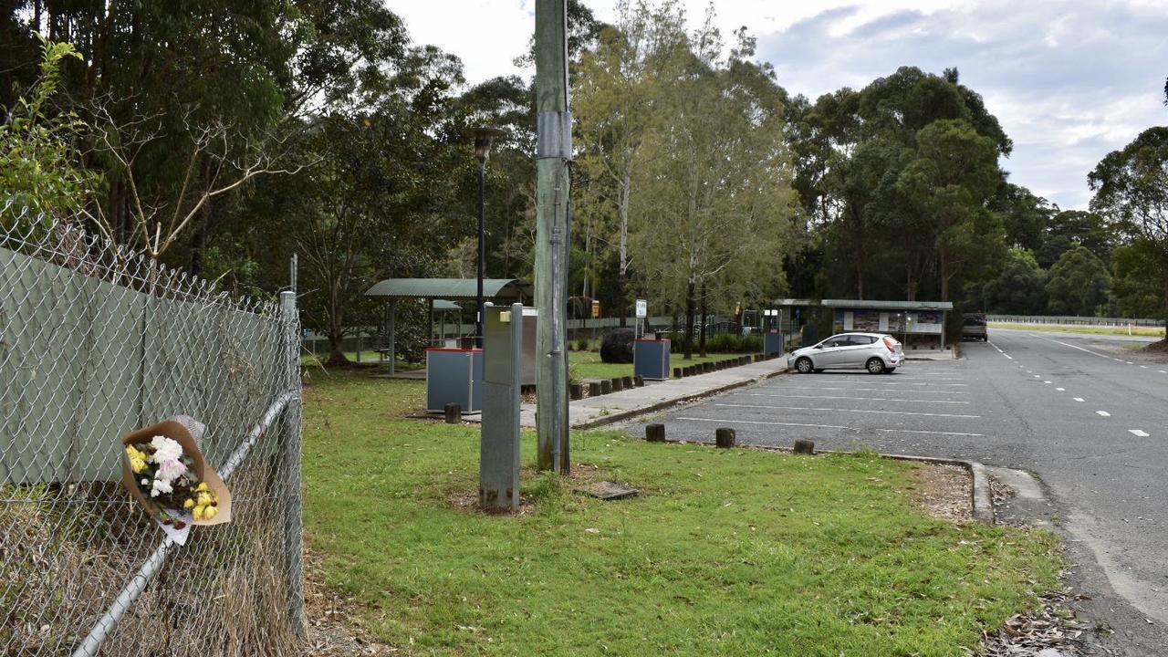 Friends of Jackson Stacker left flowers at the Sleepy Hollow rest area on the Pacific Highway, after his body was found nearby in August 2021. Picture: Javier Encalada
