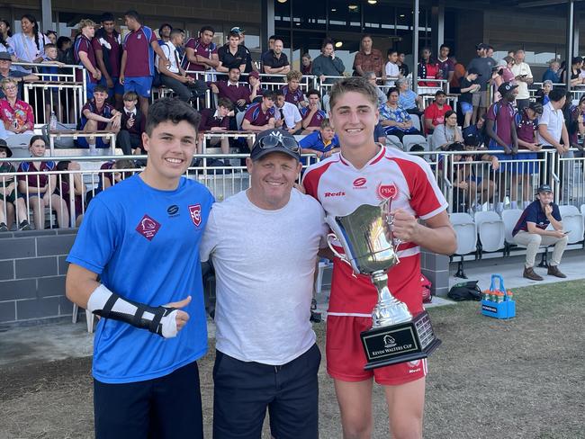 Palm Beach Currumbin players Marley McLaren and Taj lateo with Broncos legend Kevin Walters after the school won the Walters Cup.