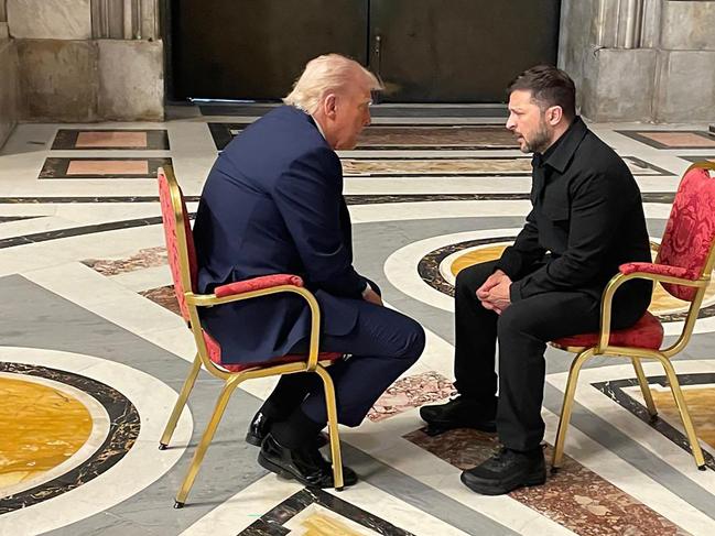 Donald Trump and Volodymyr Zelensky speak on the sidelines at the Pope’s funeral. Picture: AFP