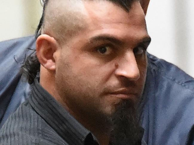 Constantinos George Spaliaras arrives in the prison van at the Mebourne Supreme Court to faces charges over the death of a man found dismembered in the Maribynong river.  ID confirmed by Shannon Deery.  Picture: Nicole Garmston