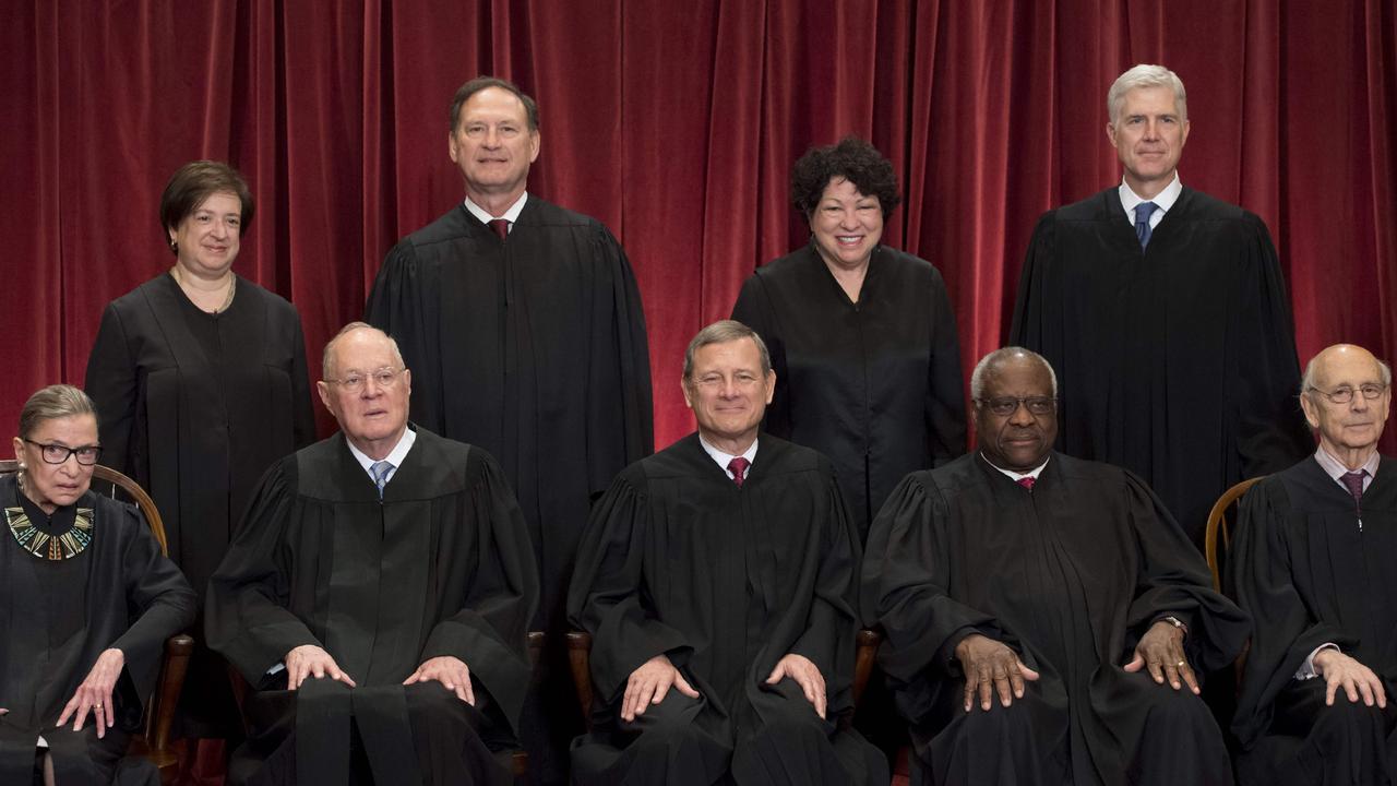 Seated (l-r): Associate Justices Ruth Bader Ginsburg and Anthony M. Kennedy (retired), Chief Justice of the US John G. Roberts, Associate Justices Clarence Thomas and Stephen Breyer. Standing (l-r): Associate Justices Elena Kagan, Samuel Alito Jr., Sonia Sotomayor and Neil Gorsuch. Picture: Saul Loeb/AFP