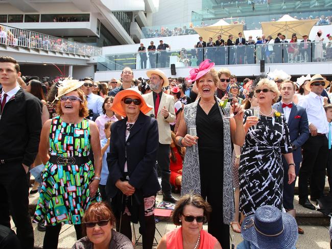 Standing room only: Every vantage point trackside is a precious commodity on race day